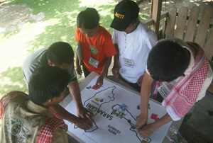 MAP IT OUT. Lumad participants identify the natural resources of  their respective provinces during a gathering on climate change in  Island Garden City of Samal.Toto Lozano / AKP Images