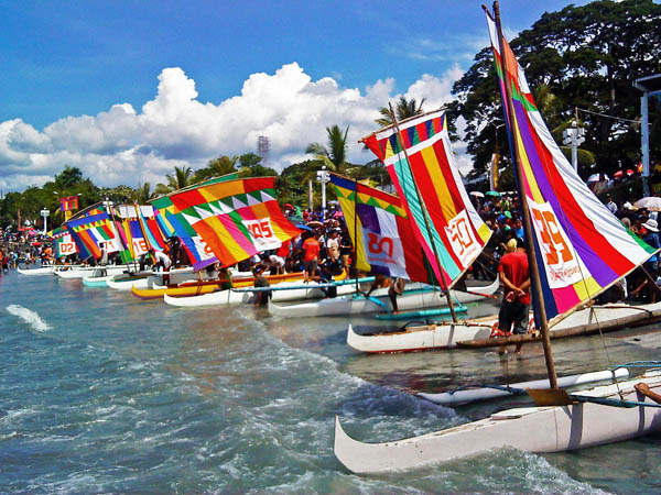 Participants to the 37th Regatta Zamboanga line up their colorful vintas (boats) along Cawa-cawa Boulevard in Zamboanga City on Sunday, October 9, 2011. The race is one of the activities of the fiesta celebration of Zambonga City's patron saint Nuestra Senora del Pilar (Our Lady of the Pillar) on October 12. MindaNews photo by Jules Benitez