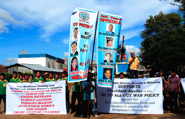 Members of various organizations in Lanao del Sur hold a rally in Marawi City on Monday, October 24, 2011, to denounce Senators Panfilo Lacson and Juan Ponce Enrile, Rep. Rodolfo Biazon and some anchors of TV network ABS-CBN for allegedly feeding on the grief and anger caused by the death of 19 soldiers in Basilan. MindaNews photo