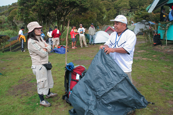 Mountaineers set up tents at the Energy Development Corporation (EDC) campsite, coming up via the VIP Trail in this file photo taken April 2009. MindaNews photo by Bobby Timonera