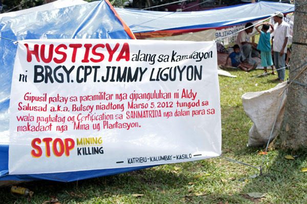 Residents of Barangay Dao, San Fernando town in Bukidnon are holding a "camp-out" at the capitol grounds in Malaybalay City on March 20, 2012 to protest the killing of barangay chair Jimmy Liguyon, who was slain on March 5, 2012. MindaNews photo by H. Marcos C. Mordeno