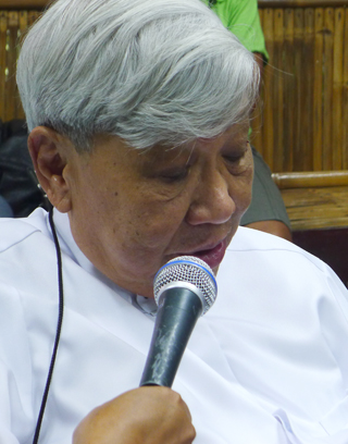 Diocese of Marbel Bishop Dinualdo Gutierrez reads his statement in connection with the October 18 killing of a mother and her two sons in the mines development site of foreign-backed Sagittarius Mines, Inc., during a press conference Monday afternoon (October 22, 2012) at the bishop's residence in Koronadal City. Bong S. Sarmiento / MindaNews