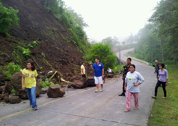 Gov. Emmylou Talino-Mendoza inspects the landslide site on Sunday morning in Barangay Kimadzil, Carmen, North Cotabato following the magnitude 5.7 magnitude earthquake on Saturday night. Photo courtesy of the Office of the Provincial Governor