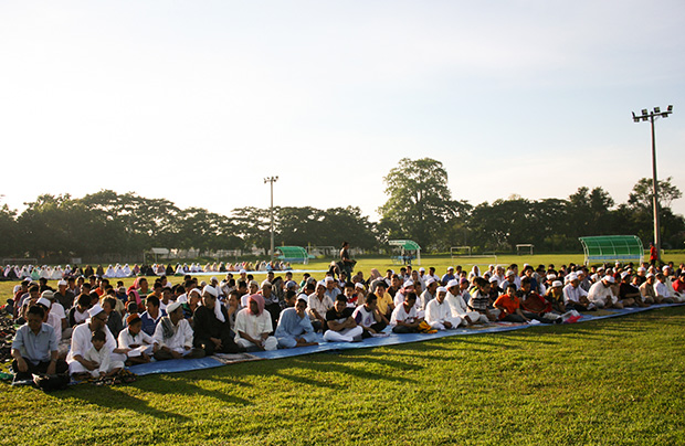 Muslims gather and pray at Tionko Field, Quimpo Boulevard in Davao City on August 9, 2013 as they celebrate Eid ul Fitr. The event marks the end of Ramadhan, the Holy Month for Muslims. MindaNews photo by Toto Lozano