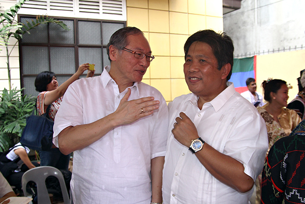 Press Secretary Sonny Coloma (right) in a huddle with businessman John Gaisano at the launch of OUR Mindanao weekly newsmag in Davao CIty on August 28. Coloma said going weekly is a “bold foward initiative" while Gaisano said it is a “very good step” and Mindanawons stand to benefit from having a Mindanao paper. MindaNews photo by Erwin Mascarinas