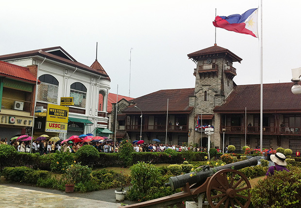 The Philippine flag flies at half mast outside the Zamboanga City Hall on Monday, Sept. 30, in honor of the policemen, soldiers and civilians who died during the standoff with the Moro National Liberation Front Misuari faction. Monday's flag-raising at City Hall was the first since the standoff that lasted over two weeks and displaced over 100,000 residents. Photo courtesy of MinHRAC