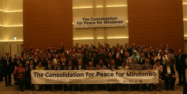Participants and organizers of The Consolidation for Peace for Mindanao (COP-6) flash the Peace sign on the first day of the three-day seminar last week. The seminar discussed obstacles and opportunities in the implementation of the Comprehensive Agreement on the Bangsamoro. Photo courtesy of REPUSM 