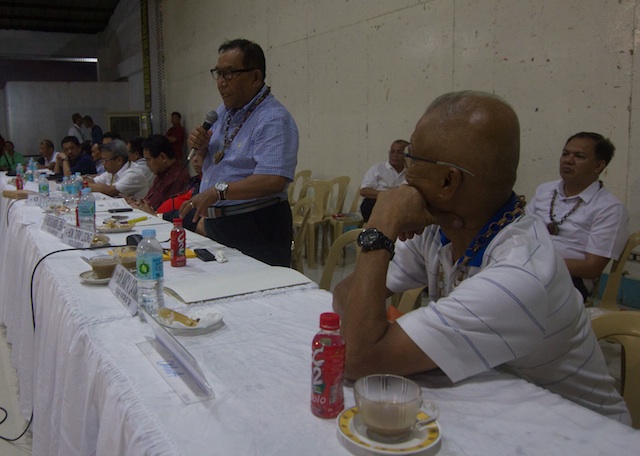 Two warriors tired of war:: Sulu Rep. Tupay Loong (holding microphone) and Muntinlupa Rep. Rodolfo Biazon at the public hearing on the Bangsamoro Basic Law in Upi, Maguindanao on October 22, 2014. MindaNews photo by Toto Lozano 
