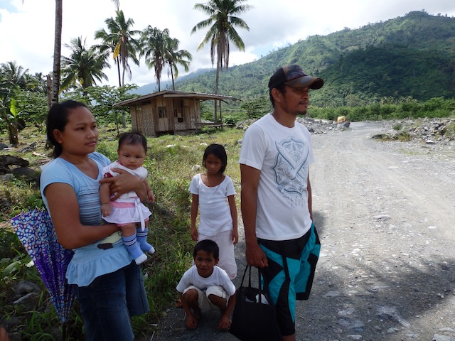 Farmer Bonifacio Casag, 37, left Barangay Andap, New Bataan last year for another village where he continues to farm and where he now resides with his new family - his wife Griselda, 23, and two-month old Vanessa. MindaNews photo by Carolyn O. Arguillas 