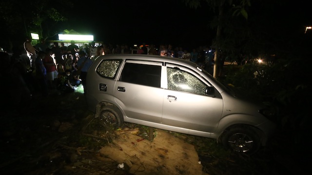 The bullet-riddled vehicle of the Busque couple, George and Marilyn. The couple was ambushed in Datu Odin Sinsuat, Maguindanao on Saturday evening. MIndaNews photo by FERDINANDH B. CABERRA 