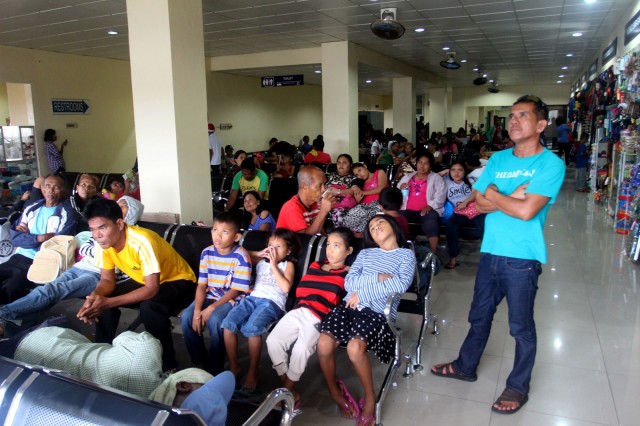 Stranded passengers at the Lipata Port in Surigao City. MindaNews photo by Roel Catoto