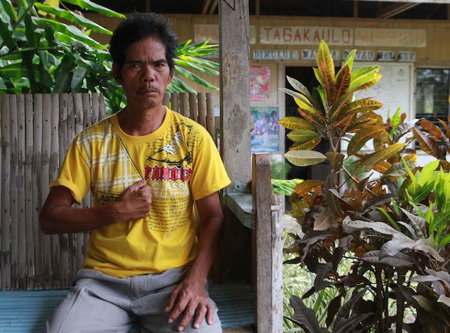 Orlando "Kaido" Engo describes how he was punched several times by members of the Special CAFGU Armed Auxiliary (SCAA) and Corporal Sandy Batolbatol during an interview at Malita Tagakolu Mission, Barangay Demoloc, Malita, Davao Occidental on March 11, 2016. On February 19, Kaido was fetched by members of the SCAA from his home and was subjected to torture for a crime he said he did not commit. MindaNews photo by TOTO LOZANO