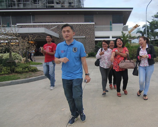 VENUE. Christopher Lawrence “Bong” Go leaves the Matina Enclave Clubhouse after conducting an ocular inspection late Saturday afternoon, May 14. Presumptive President-elect Rodrigo Duterte will receive well-wishers in at least three rooms in the Clubhouse for three days starting Monday, May 16. MindaNews photo by TOTO LOZANO