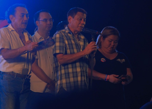 WARNING. President-elect Rodrigo Duterte delivers a 32-minute thanksgiving speech at the “One Love, One Nation” party at the Crocodile Park in Maa, Davao City Saturday night, June 4. The speech, still laced with expletives and warnings, was cut short due to the rains. MindaNews photo by TOTO LOZANO. 