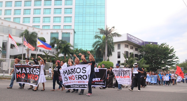 In Davao City, protesters did a quick march in the vicinity of the Freedom Park Friday before speakers took turns expressing their rage against the burial of the deposed dictator Ferdinand Marcos at the Libingan ng mga Bayani on Nov. 18. MindaNews photo by GREGORIO BUENO 